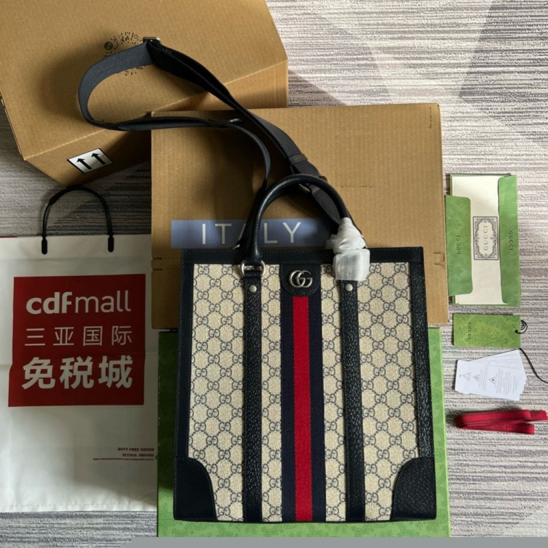 G*u*i shopping bags